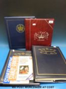 Two albums of coin / stamp covers of the Royal Family and one album for the Queen's 2002 Golden