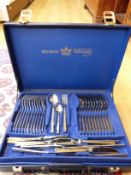 A cased stainless steel cutlery set by Bestecke Solingen together with a silver plate boxed fish