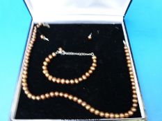 A brown pearl necklace,