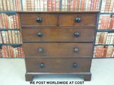 A Georgian elm straight chest of two over three graduated drawers (H104, W99,