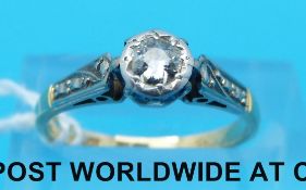 A 9ct gold ring set with a round cut cubic zirconia (size O)