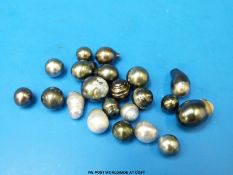 Twenty one Tahitian baroque pearls including one large example.