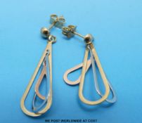 A pair of 9ct gold oval drop earrings