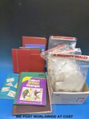 A box of loose stamps,