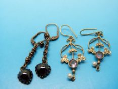 A pair of gold Edwardian earrings set with pearls and amethysts together with another pair