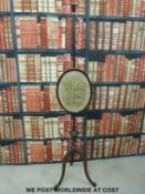 A Robert Adam-style mahogany pole screen with tripod base (H167cm)