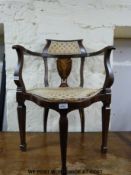 An inlaid mahogany corner chair