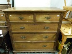 A late Victorian ash chest of three long graduated drawers and two short drawers,