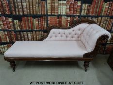 A 19thc carved mahogany pink upholstered chaise longue (Length 192cm)