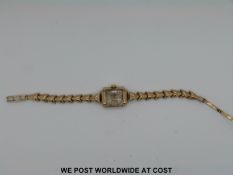 Two ladies wristwatches marked 375 and an early 20thC ladies continental enamel-faced watch marked