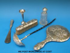 A hallmarked silver whale bone handled toddy ladle,