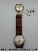 Two gentleman's wristwatches, one Bucherer in stainless steel case on brown leather strap,