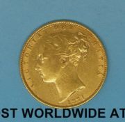 An 1871 young head gold full sovereign shield reverse,