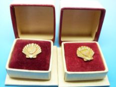 Two 9ct gold BP long service buttonholes in the form of a shell (20 and 30 years) one set with two