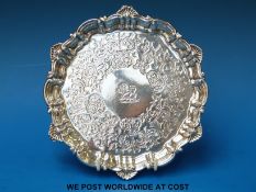 A Victorian hallmarked silver salver with shaped edge and engraved decoration, Ldn 1864,