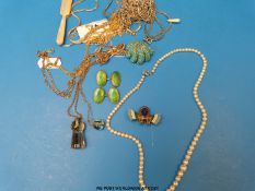 A single strand pearl necklace, silver chains, millefiori pendant,