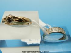 Two 9ct gold rings one set with diamonds in a cluster and the other set with diamonds in two rows