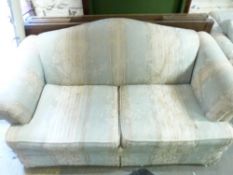 A blue three seat sofa together with a matching two seat sofa