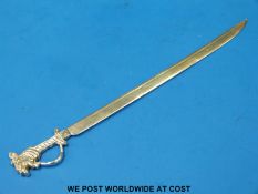 A Burmese white metal letter opener formed as a sword with silver marks to blade (length 20cm) 24g