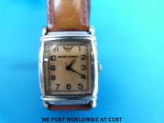 An Emporio Armani watch on brown leather strap