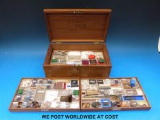 A 19thC box of named educational samples with three layers,
