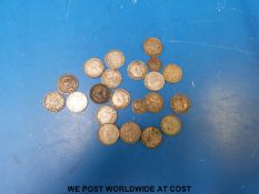 A quantity of small silver coins including an undated Charles II maundy penny and a Victorian