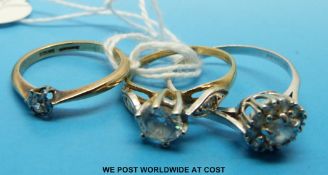 Two 9ct gold rings set with cubic zirconia and a white gold ring set with cubic zirconia