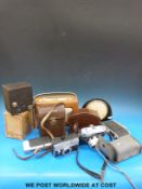 A collection of cameras and ephemera to include Bell & Howell camera, Smiths clock, Roberts radio,