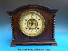 Ansonia visible escapement two-train mantel clock with gilt bezel and barley twist decoration to