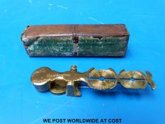 A boxed set of Harrison sovereign scales