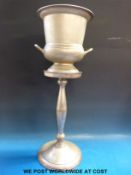 A plated wine cooler on stand,