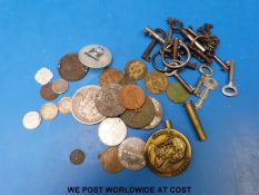 An 1848 5 franc silver coin, three VF British West African silver threepenny pieces for 1914,