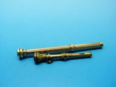 A yellow metal pencil by Mordan & Co with engine turned decoration and an agate top and a smaller