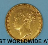 An 1873 young head gold full sovereign,shield back, die no 5,