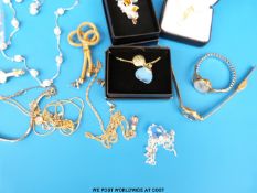 A collection of costume jewellery to include watches,