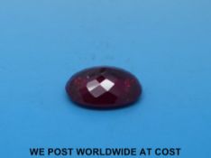 A pink topaz measuring 27.