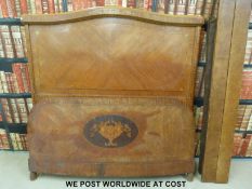 A 19thC French kingwood double bed with quarter veneered and crossbanded headboard and gilt mounts