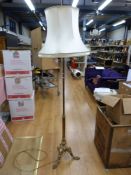 An Art Deco style light fitting with central leaded glass bowl surrounded by four smaller shades