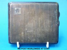 A hallmarked silver cigarette case with engine turned decoration (weight 142g)