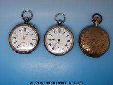 Two silver gentleman's pocket watches with keywinding movements together with a keyless hunter