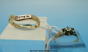 Two 9ct gold rings one set with diamonds (size O) and the other set with a central diamond