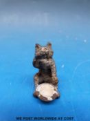 An Austrian cold painted figure of a cat with bowl (height 3cm)