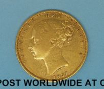 An 1857 young head gold full sovereign shield reverse