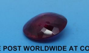 A pink topaz measuring 32.