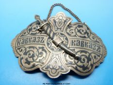 A Russian Niello silver buckle with scimitar clasp