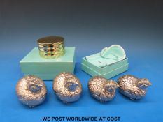 Tiffany & Co desk clock in box together with another Tiffany box and four Gucci bird peppers.