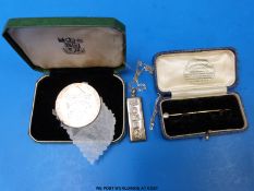 A feature hallmarked silver ingot,