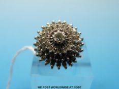 An 18ct white gold ring set with diamonds in a cluster (size M/N)