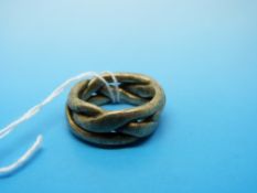 A large 9ct gold ring of plaited form, import marks for Sheffield (26.
