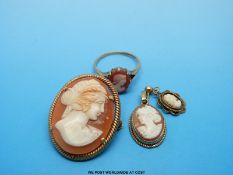 A 9ct gold ring set with a cameo, a yellow metal brooch set with a cameo,